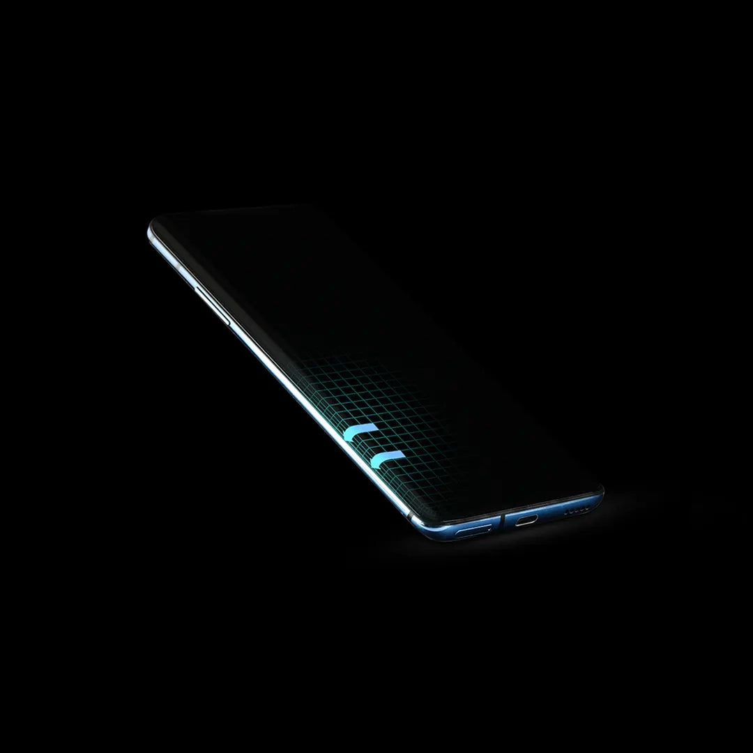 A close-up of a curved screen phone with a transparent screen protector applied. The protector seamlessly follows the curves of the phone's screen.